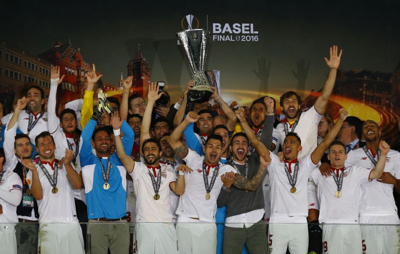 Football Soccer - Liverpool v Sevilla - UEFA Europa League Final - St. Jakob-Park, Basel, Switzerland - 18/5/16 Sevilla celebrate with the trophy after the game Reuters / Marcelo del Pozo Livepic EDITORIAL USE ONLY.