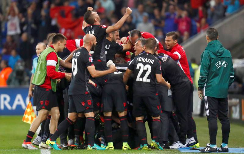 Football Soccer - Romania v Albania - EURO 2016 - Group A - Stade de Lyon  - Lyon, France - 19/6/16 Albania's Armando Sadiku celebrates with team mates after scoring a goal          REUTERS/Kai Pfaffenbach