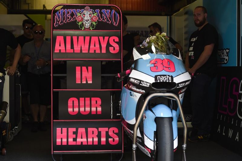 SAG Team Moto2 Spanish rider Luis Salom's motorbike is parked in the box after a tribute for the rider in the Moto GP of the Catalunya Grand Prix at the Montmelo racetrack near Barcelona on June 5, 2016. The SAG team's 24-year-old Spanish rider Salom suffered fatal injuries when crashing at Turn 12 on the challenging circuit near Barcelona in the second free practice session on June 3, 2016.  / AFP PHOTO / JOSEP LAGO