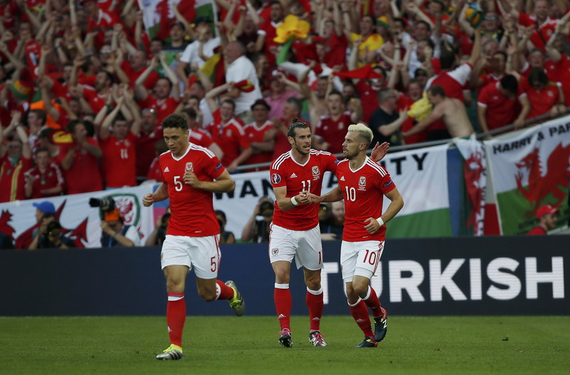 Football Soccer - Russia v Wales - EURO 2016 - Group B - Stadium de Toulouse, Toulouse, France - 20/6/16 - Wales' Aaron Ramsey celebrates after scoring a goal with Gareth Bale and James Chester. REUTERS/Sergio Perez